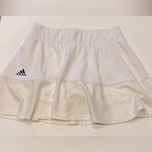 Adorable Adidas Golf Skirt with inside shorts. Excellent condition. Worn once!